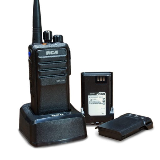 Two-way radio battery life concept: An RCA RDR2500 handheld unit sits in a charger beside two replacement radios.