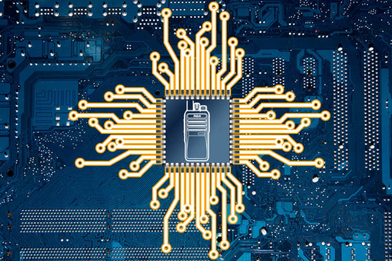 A radio chip with the outline of an RCA handheld two-way radio.